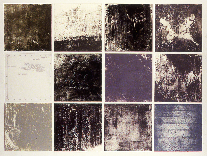 A grid of twelve images, each with different abstract textures and colors, ranging from dark browns and blacks to blues and whites. One image in the second row appears to contain text but is not legible. The overall effect is reminiscent of a series of experimental or distressed prints.