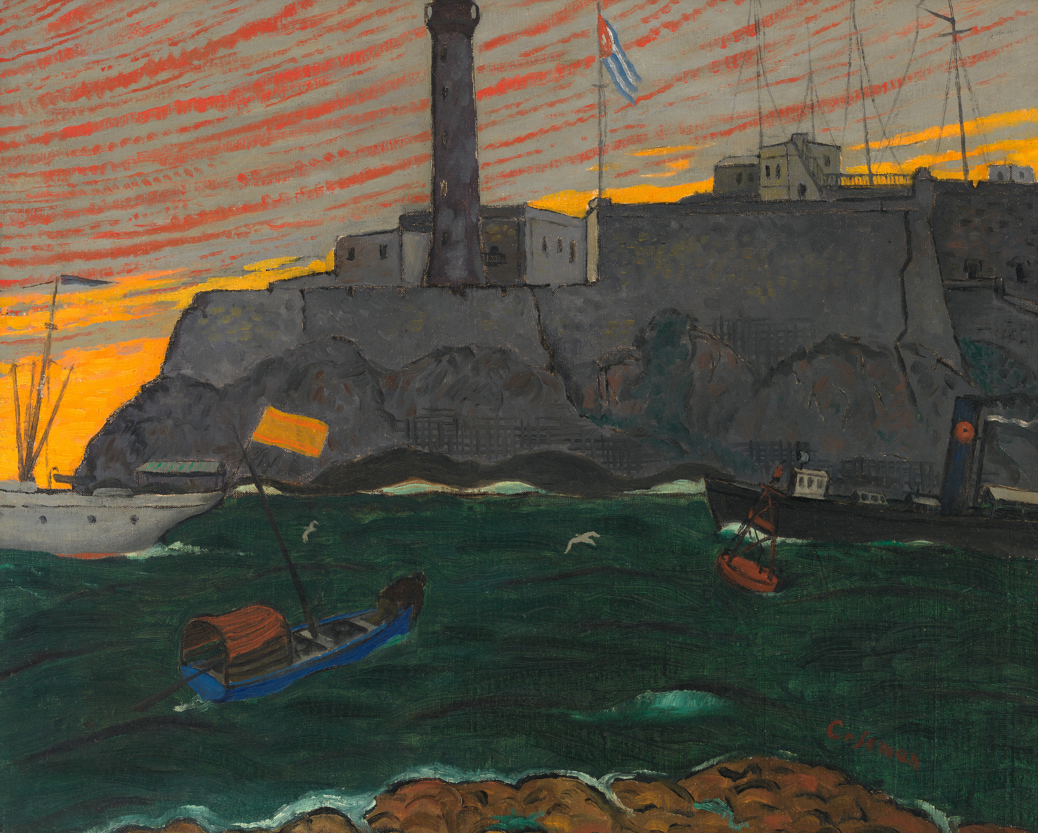 A painting depicting a coastal scene at dusk with a lighthouse on a rocky promontory. The sky is streaked with red and orange hues, suggesting sunset. Several boats, including a sailboat with an orange sail and a steamboat, are on the dark green sea. In the foreground, there's a rocky shore with brownish formations. The artist's signature, "Cézanne," is visible in the lower right corner.