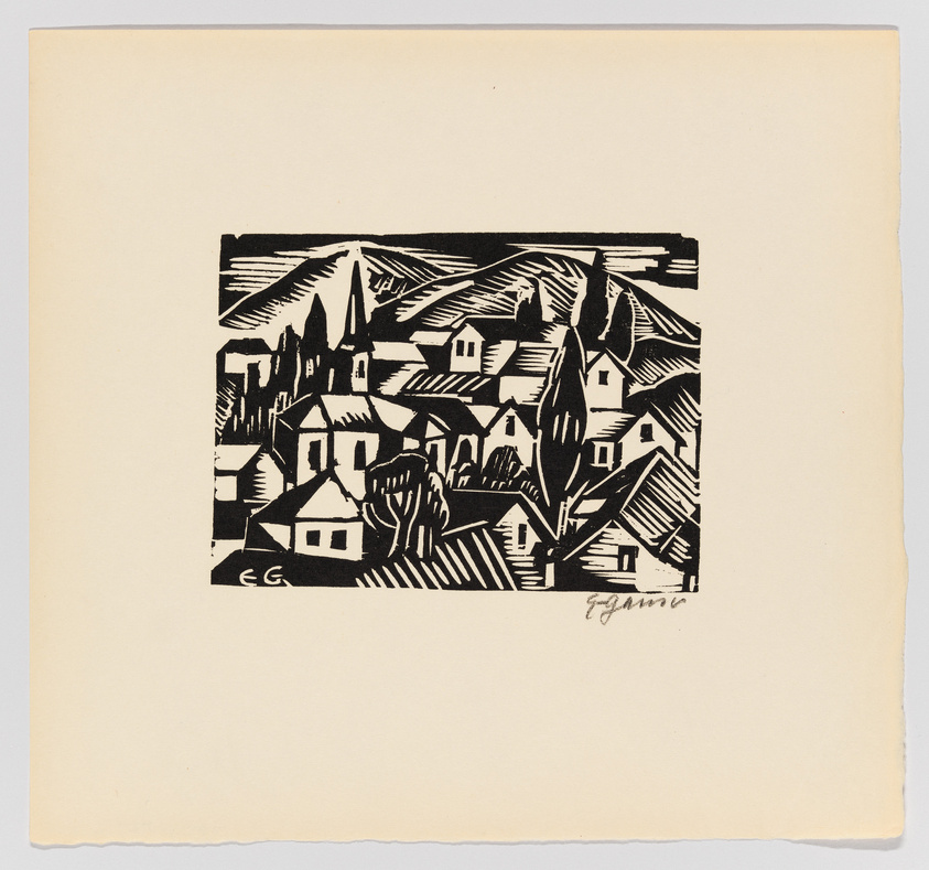 A black and white woodcut print depicting a stylized village scene with houses, trees, and a church spire, set against a backdrop of hills or mountains. The image is characterized by bold contrasts and angular lines, and it is signed by the artist in the lower right corner. The print is centered on a cream-colored paper with a slightly textured edge.