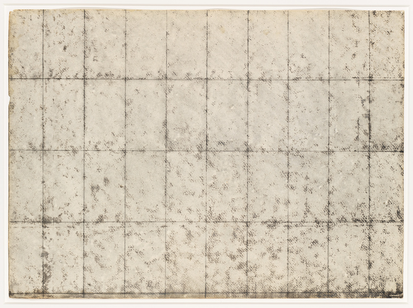 A worn and aged piece of paper with a grid of dark lines creating a pattern of squares, showing signs of discoloration and spotting throughout.