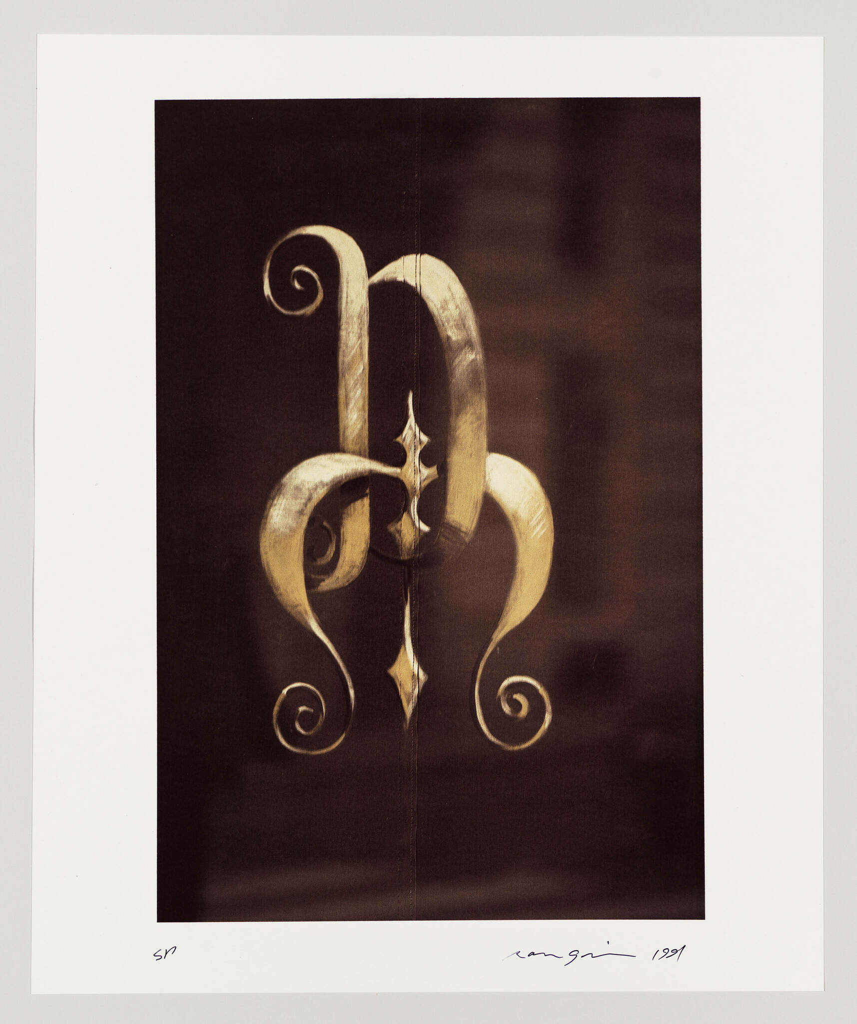 A sepia-toned photograph of an ornate, gold-colored treble clef on a dark background, with a signature and date in the lower right corner, and a series number in the lower left corner.