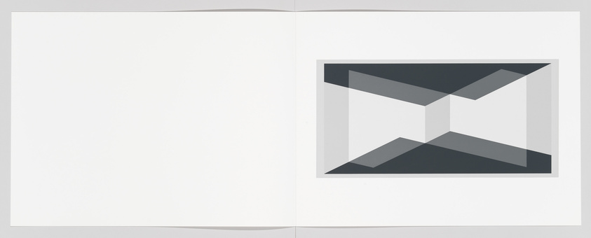 A wide-open book with blank white pages, featuring a centered abstract geometric art piece on the right page, composed of various shades of gray forming a three-dimensional box-like structure.