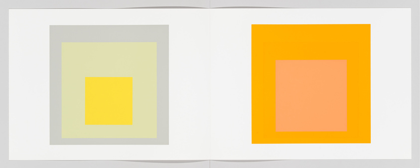 Open book with two pages showing abstract art of concentric squares in pastel colors.