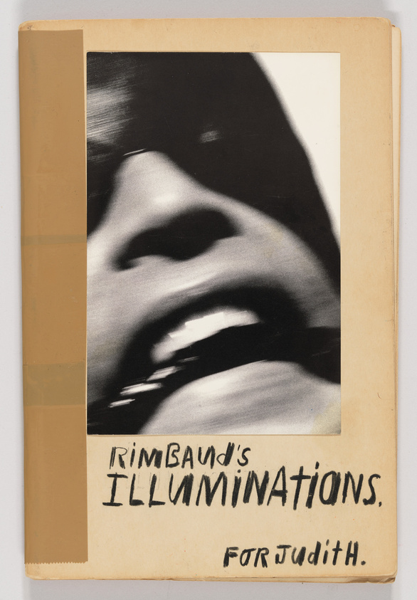 A vintage book cover with a black and white abstract photo of a person's face, focusing on the mouth and nose, with the title "Rimbaud's ILLUMINATIONS" handwritten in black ink below the image, and a dedication "FOR Judith." on a beige background with visible wear and tape on the edges.