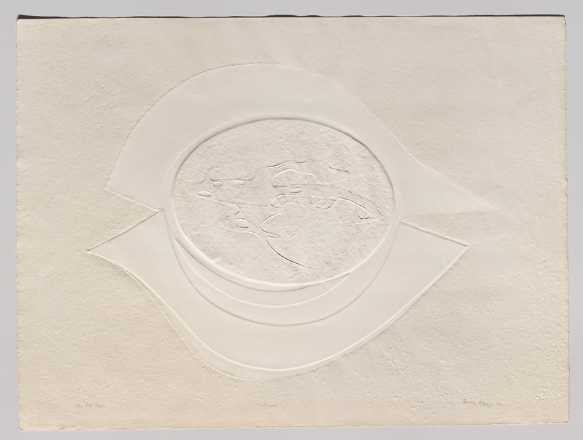 A textured white artwork with embossed concentric circles and abstract patterns, signed by the artist in the lower right corner.