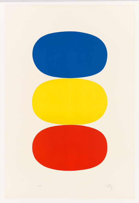 A minimalist artwork featuring three large, flat-colored ellipses stacked vertically. The top ellipse is blue, the middle is yellow, and the bottom is red. The background is white, and there are signatures or markings in the bottom corners of the print.