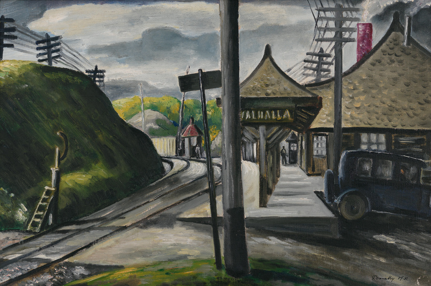 A painting depicting a street scene with a train station named "VALHALLA" on the right, featuring a traditional roof and signage. A vintage car is parked beside the station, and a few figures are visible in the distance. Utility poles with multiple crossbeams and wires line the left side of the street, leading the eye towards a cloudy sky above a hilly landscape. The painting is signed and dated in the lower right corner.
