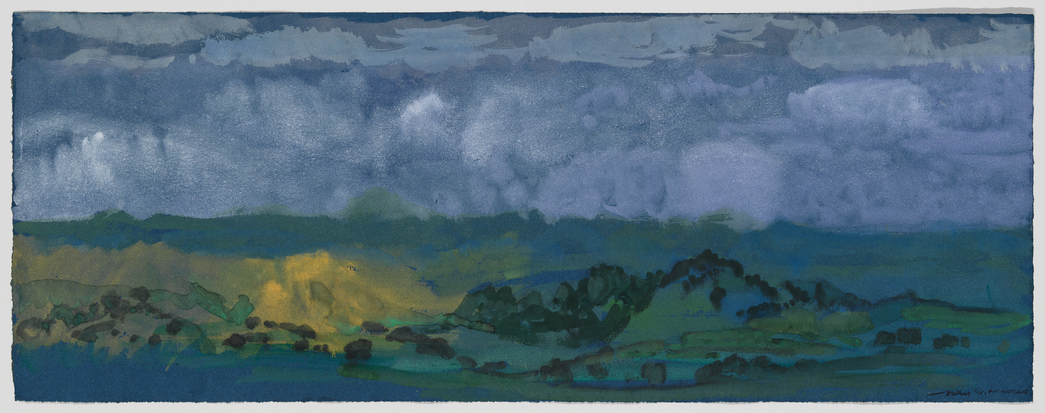 A panoramic watercolor painting depicting a moody landscape with dark, stormy clouds above rolling hills. The foreground features patches of green and yellow fields, suggesting sunlight breaking through the overcast sky, while the rest of the terrain is rendered in shades of blue and green, creating a sense of depth and atmosphere. The artist's signature is visible in the bottom right corner.