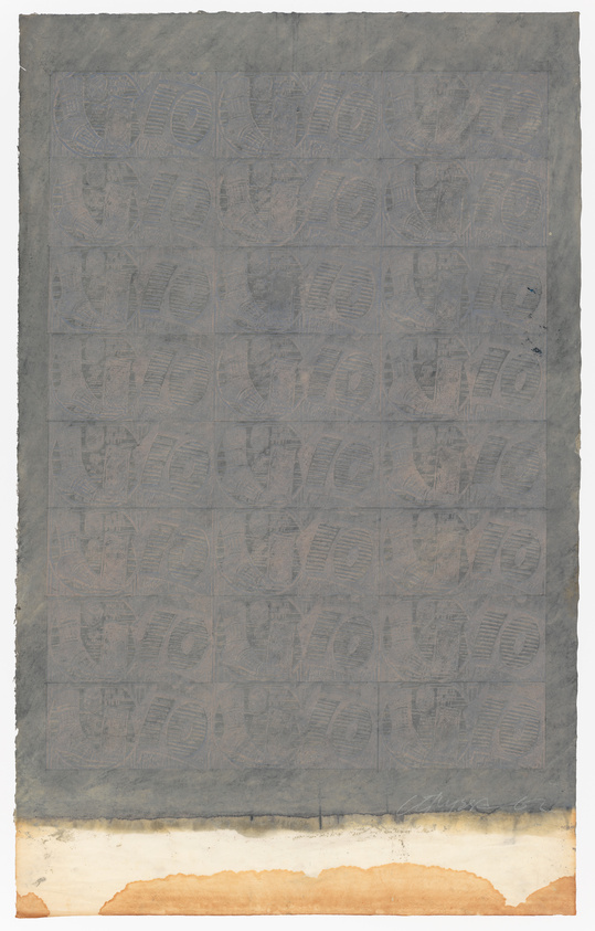 Gray textured surface with faint, repetitive "YOYO" pattern, bordered by a lighter, stained edge.