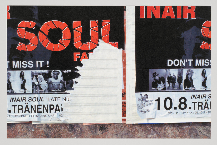 A collage of torn and layered posters on a wall, prominently featuring the word "SOUL" in large, broken red letters. Other visible text includes phrases like "DON'T MISS IT!" and partial words from various events or advertisements. Small images of people and some text about event details are also partially visible among the layers.