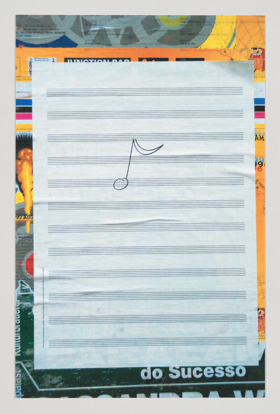 A piece of paper with musical staff lines and a single musical note drawn on it is centered on a background of various colorful printed materials, including text and images. The surrounding collage includes elements of graphic design and typography, with words like "do Sucesso" visible at the bottom.