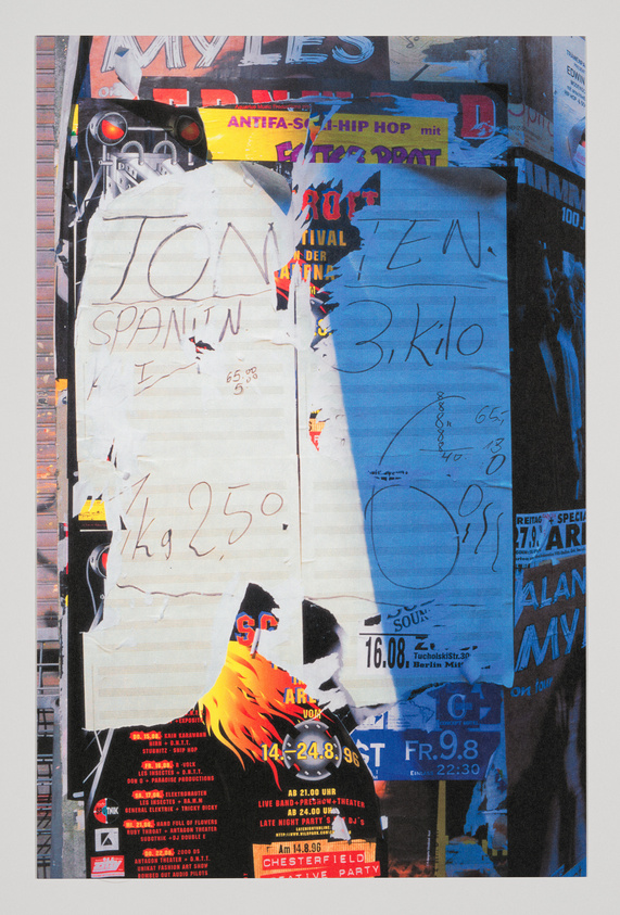 A collage of various posters and flyers overlapping each other on a wall, featuring a mix of handwritten and printed text, advertisements, and graffiti. The imagery includes elements of urban culture such as music events and product ads, with visible words like "HIP HOP," "CHESTERFIELD," and dates suggesting event schedules. The overall aesthetic is chaotic and colorful, indicative of a bustling city environment.