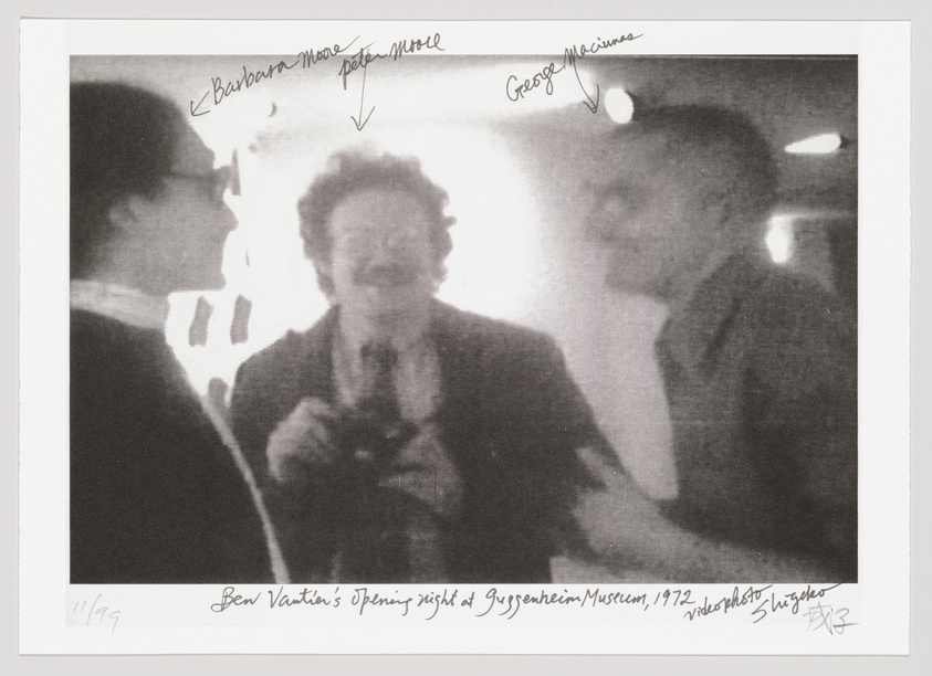 A black and white photograph depicting three individuals engaged in conversation. The image is blurry, giving it a candid and spontaneous feel. Handwritten annotations identify the individuals and provide context for the event, indicating it was taken during Ben Vautier's opening night at the Guggenheim Museum in 1972. The photo also includes a handwritten edition number and signature at the bottom.