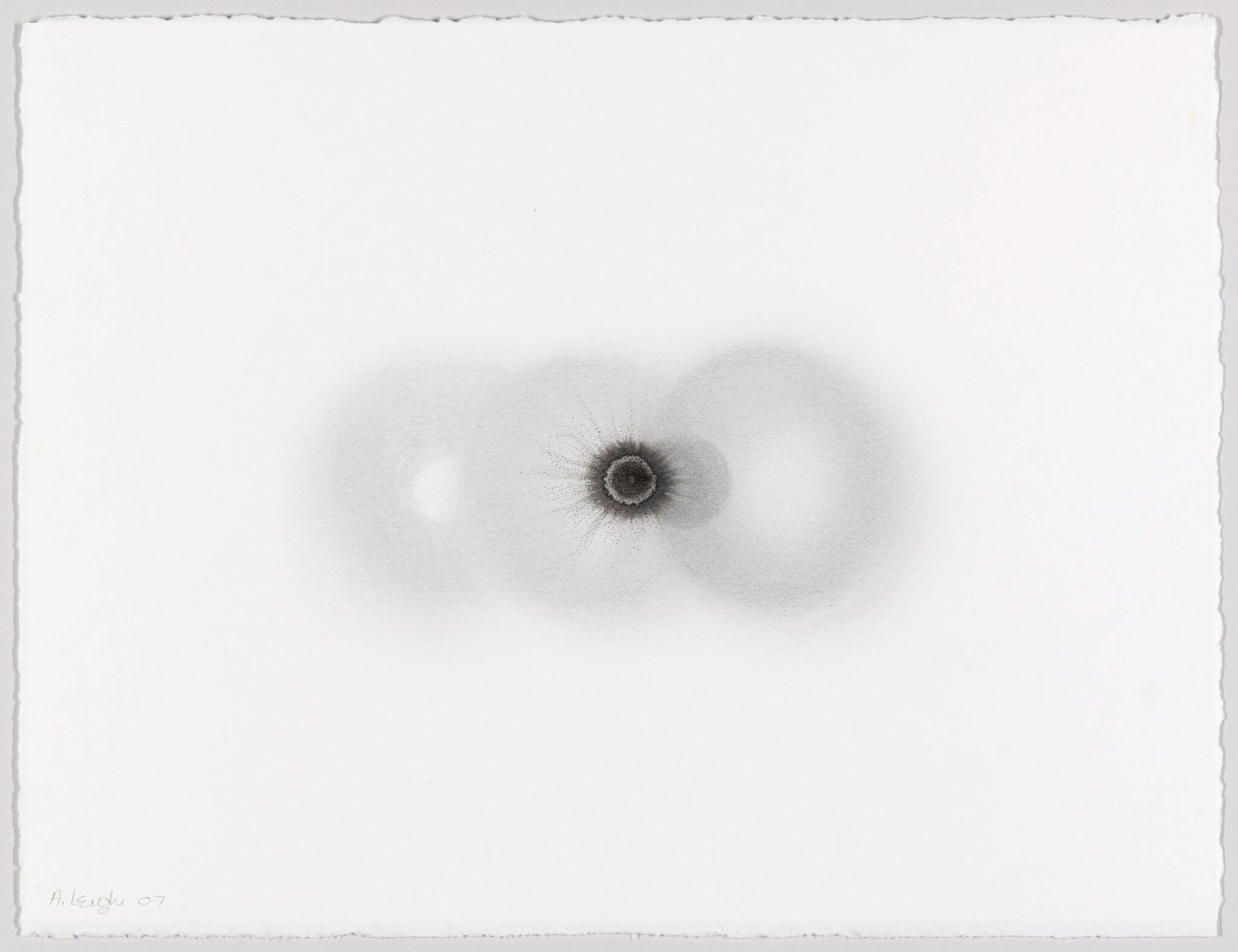 A grayscale abstract artwork featuring two overlapping circular smudges with a darker center, resembling a pair of eyes or cells, on a textured white background with the artist's signature and the year '07 in the bottom left corner.