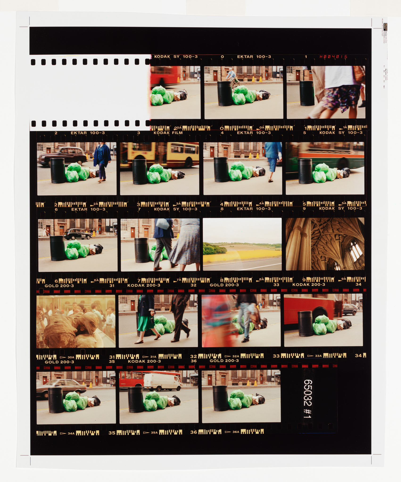 Contact sheet with multiple images of a person lying on the ground near a trash can, surrounded by green bags, with people walking by.