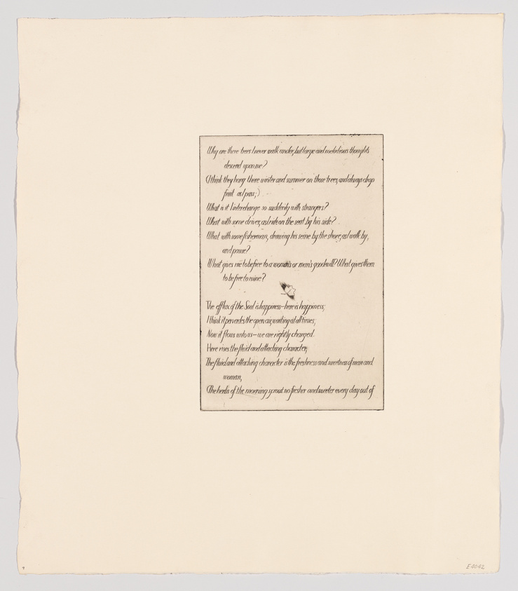 A photograph of a piece of paper with a poem printed in the center. The paper has an aged, off-white background, and the text is enclosed within a thin black border. Two small illustrations of leaves are visible, one at the beginning and one at the end of the poem. The handwriting-style font of the poem gives it a personal, intimate feel.