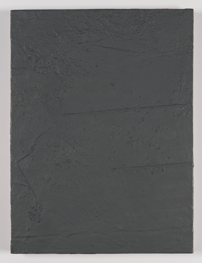 A textured monochromatic painting in various shades of dark gray, with visible brush strokes and impasto technique creating a three-dimensional effect on the canvas.