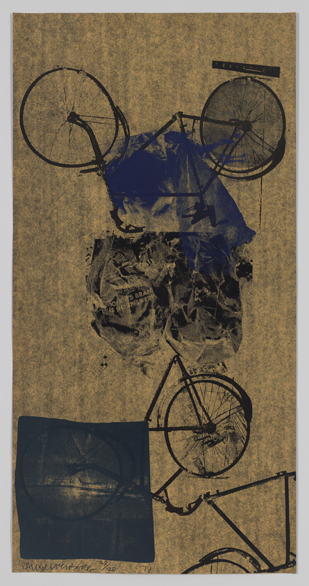 A textured artwork featuring overlapping images of bicycles and abstract shapes. The bicycles appear in a dark silhouette against a brown background, with one prominent blue shape overlaying part of the image. There's also a crumpled paper texture superimposed on the upper half. The bottom left corner includes a dark square with a faint bicycle wheel imprint and artist's signature.