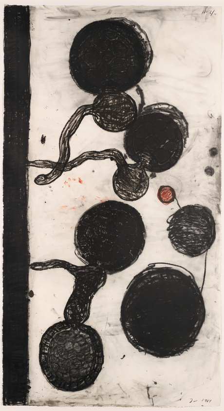 A vertical monochromatic artwork featuring a series of interconnected, textured circles in various sizes, with a dominant black and white color scheme. Some circles are detailed with patterns, while others are more solidly filled. The background is a hazy white with smudges and streaks, and there are hints of red smears near the center. The left edge of the piece has a thick, dark vertical stripe, and there are handwritten markings in the top right corner.