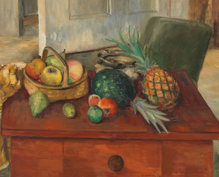 Oil painting depicting a still life arrangement with various fruits on a wooden table. A basket filled with apples and a pear is placed next to a large green and a ripe pineapple. Loose fruits, including a lemon, a lime, and two oranges, are scattered around the table. In the background, a portion of a chair and a pale wall with a hint of a window or picture frame are visible. The painting is signed "D. Vanin '30" in the lower right corner.