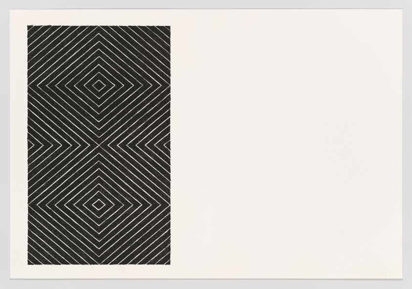 Geometric black and white pattern with diamond shapes on a rectangular panel, adjacent to a blank space.