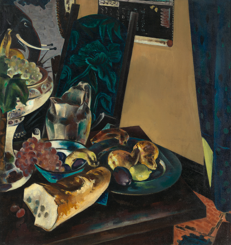 A still life painting featuring a table with various objects including a bowl of grapes, a jug, sliced bread, and figs on a plate. The background includes a dark curtain with a floral pattern, a partial view of a painting with a black figure, and a glimpse of a patterned blue textile. The scene is depicted with rich, dark tones and a play of light and shadow, creating a moody atmosphere.