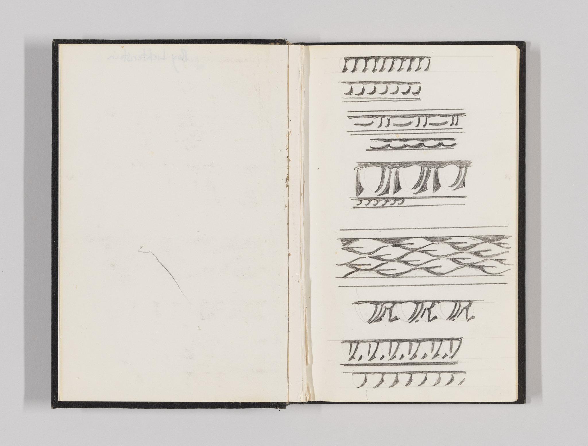 An open sketchbook with a black cover displaying a series of hand-drawn decorative border designs on the right page. The left page is mostly blank with some faint markings at the top. The designs include various patterns such as lines, dots, scallops, and leaf-like motifs.