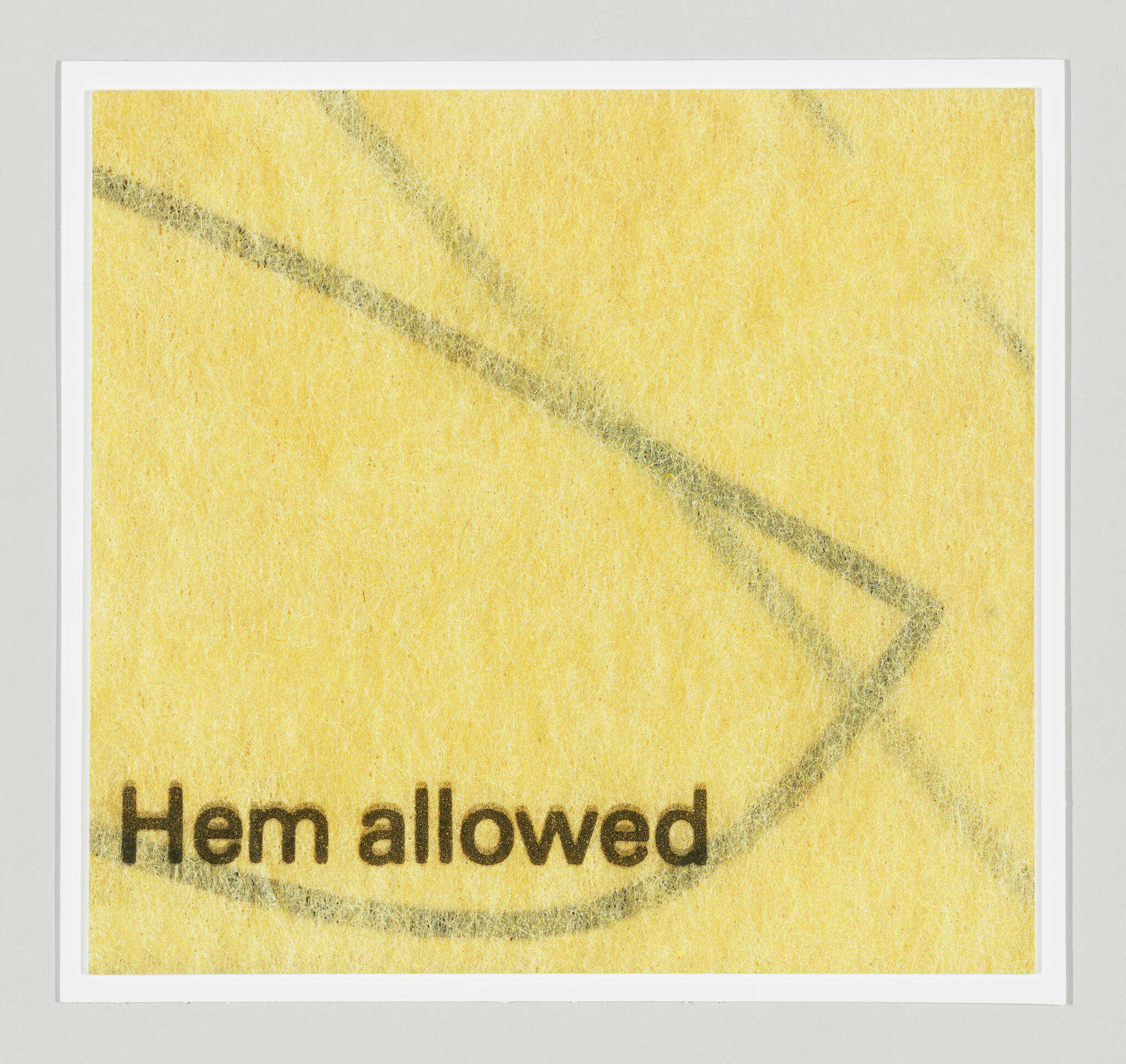 The words "Hem allowed" at the bottom and black lines tilting downward, crossing, and fading along a yellow background