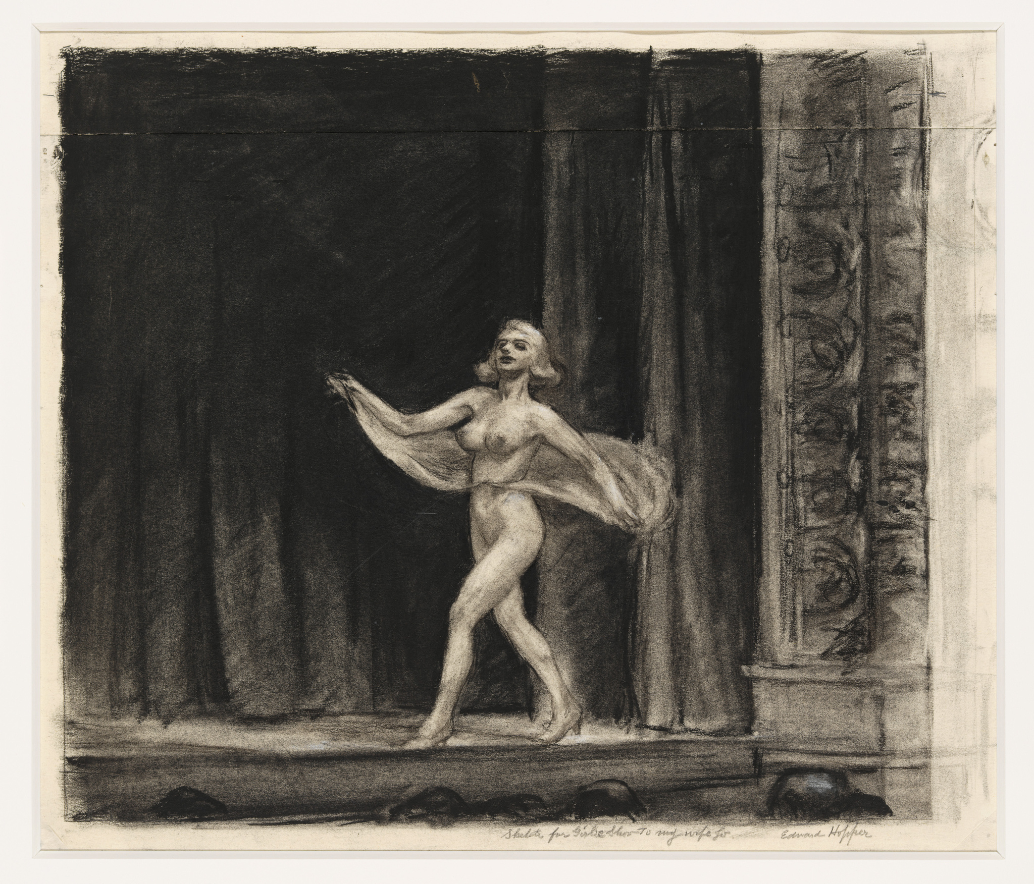 A charcoal drawing depicting a nude female figure dancing on a stage with heavy curtains to the left and a decorative column to the right. The dancer is captured in mid-movement, with one arm extended and a flowing piece of fabric in her hand. The artwork conveys a sense of motion and grace.