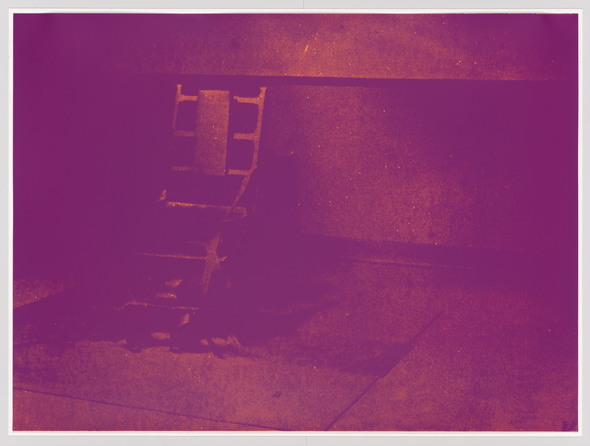 A shadowy, reddish image showing a solitary chair in a dimly lit room.