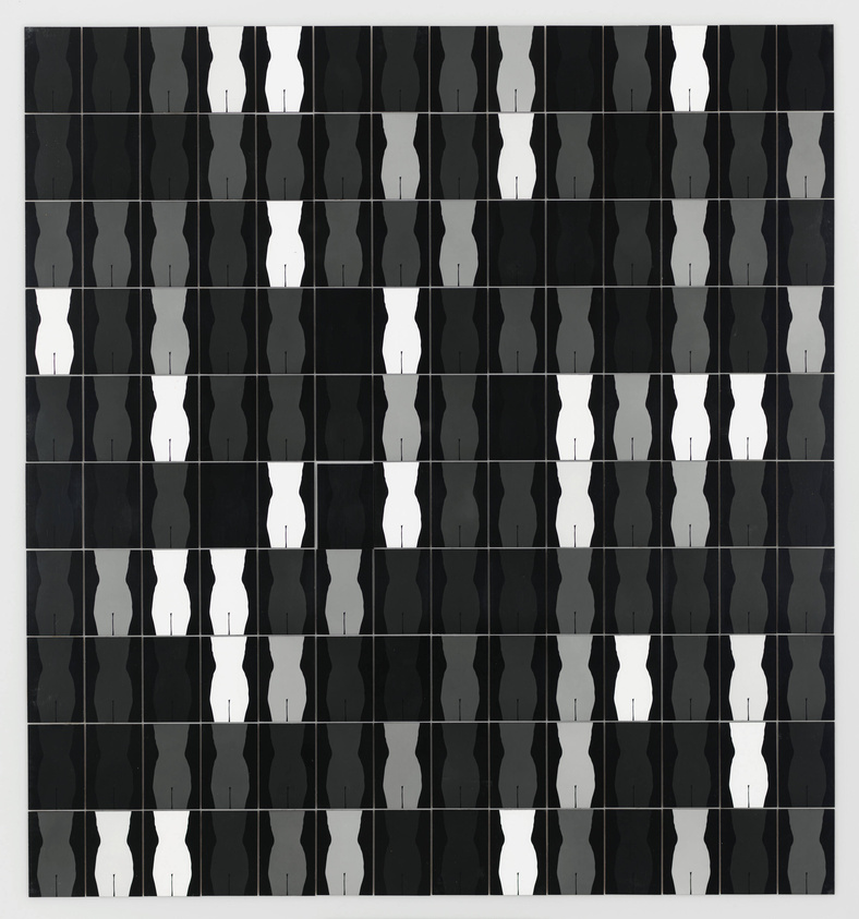 A grid of black and white tiles with a silhouette of a vase or two faces in profile depending on the viewer's perspective, creating a visual play between positive and negative space.