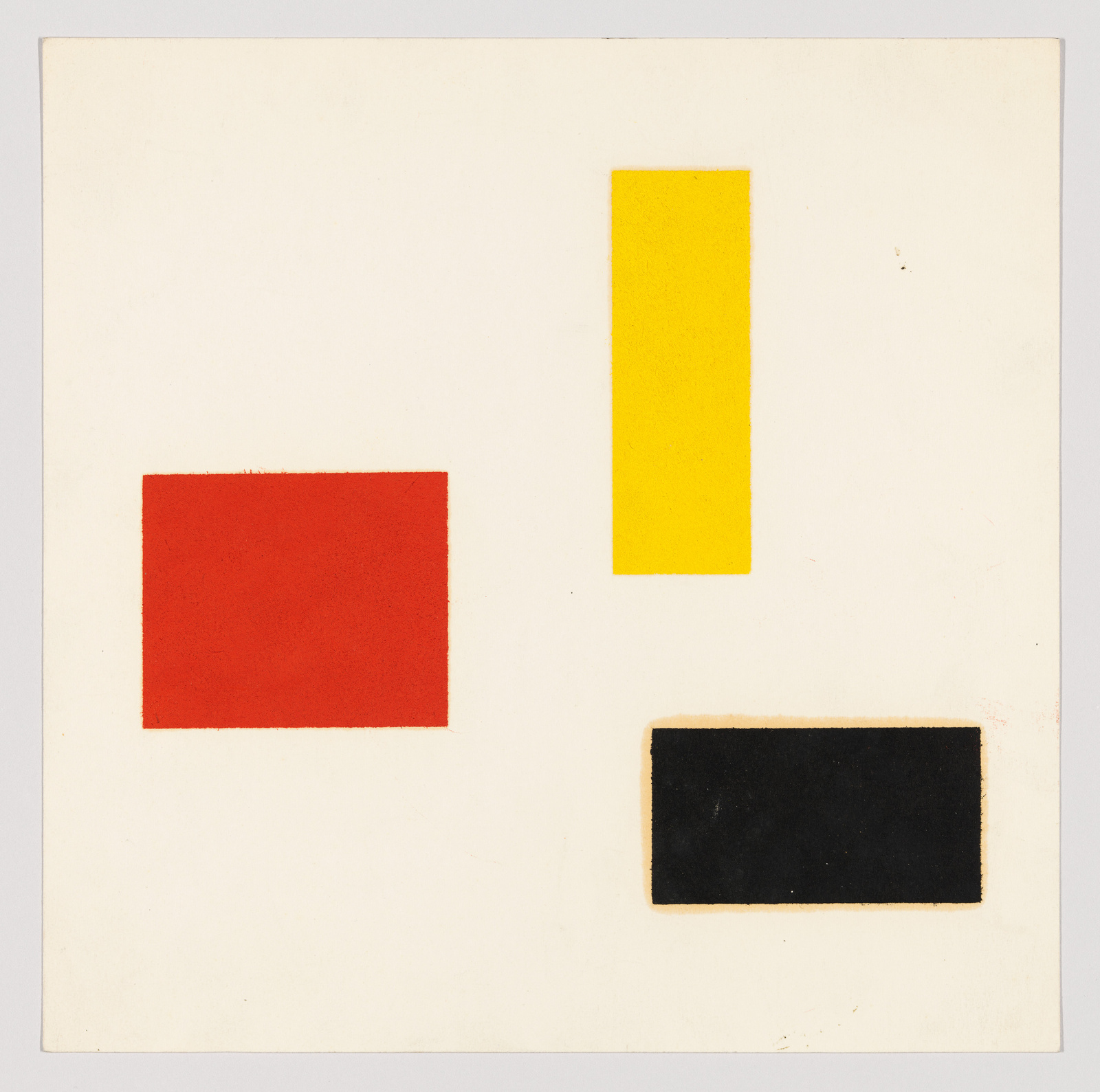 A minimalist artwork featuring three geometric shapes on a white background: a red square on the left, a yellow rectangle on the top right, and a black rectangle on the bottom right.