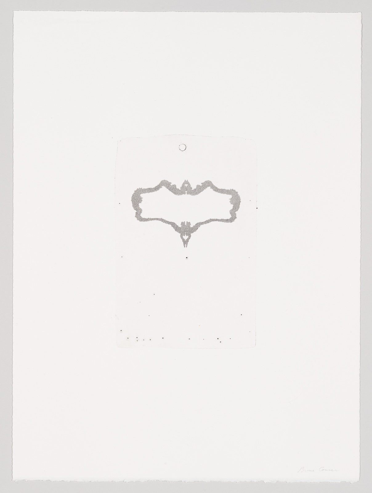 A minimalist artwork featuring a symmetrical ink blot on a rectangular piece of paper, which is centered on a larger white canvas. The ink blot has a Rorschach test-like appearance, and there are a few scattered ink spots below it. The artist's signature is visible at the bottom right corner.