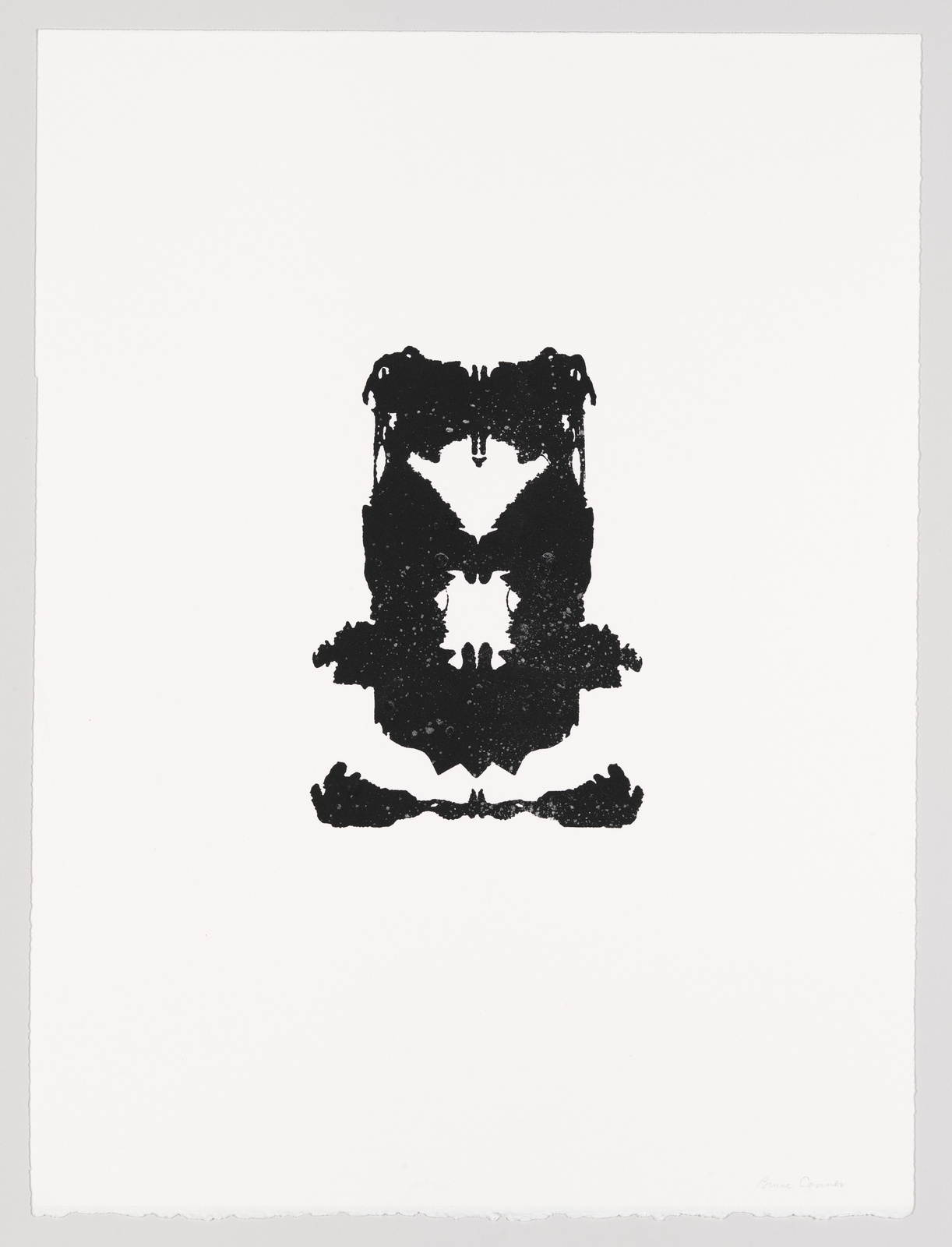 A black inkblot symmetrically patterned on a white background, reminiscent of a Rorschach test, with the artist's signature at the bottom right.