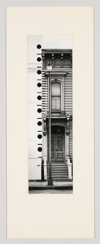 A black and white photograph of a Victorian-style house with a unique artistic twist: the left side of the image is altered to include a series of black circles decreasing in size from top to bottom, resembling a musical staff with notes, superimposed over the building's facade. The photo is mounted on a beige mat board with the artist's signature at the bottom right corner.