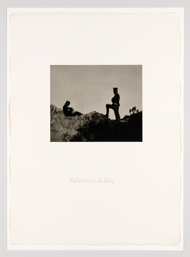 A vintage black and white photograph titled "Reflections on the Day" depicting two silhouetted figures on a hill; one is seated and the other stands with a hand on their hip, both appear to be in contemplative poses. The photo is mounted on a larger sheet of paper with rough edges.