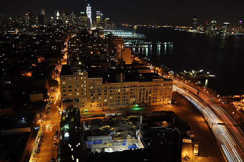 Construction site at night from above.