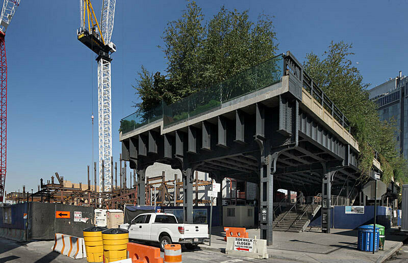 Close up of the High Line with construction site behind.