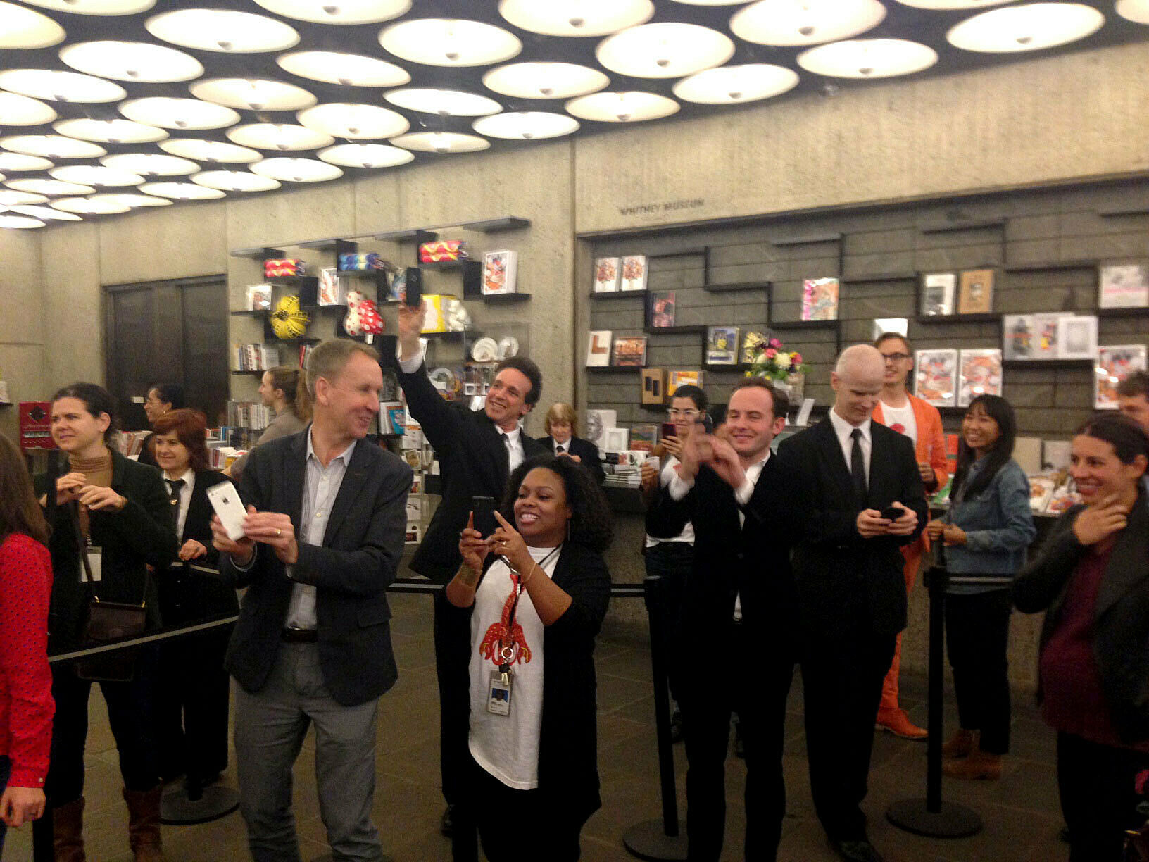 Staff taking photos as doors lock.