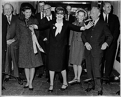 Smiling people at an opening ceremony for the Whitney Museum.