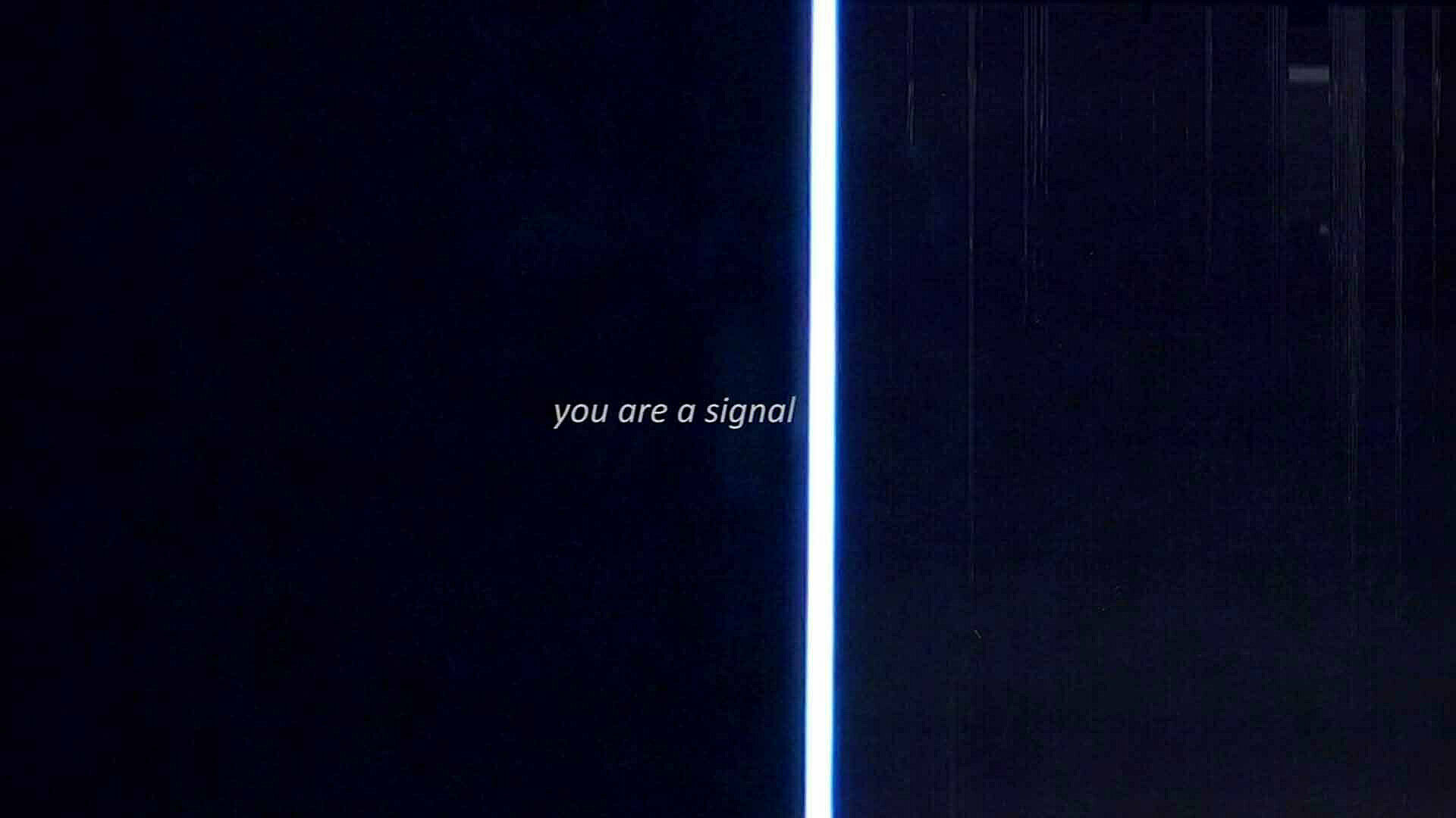 A still of a video work by Andrea Crespo. Text inscribed on a black background with a while line running down the center of the screen