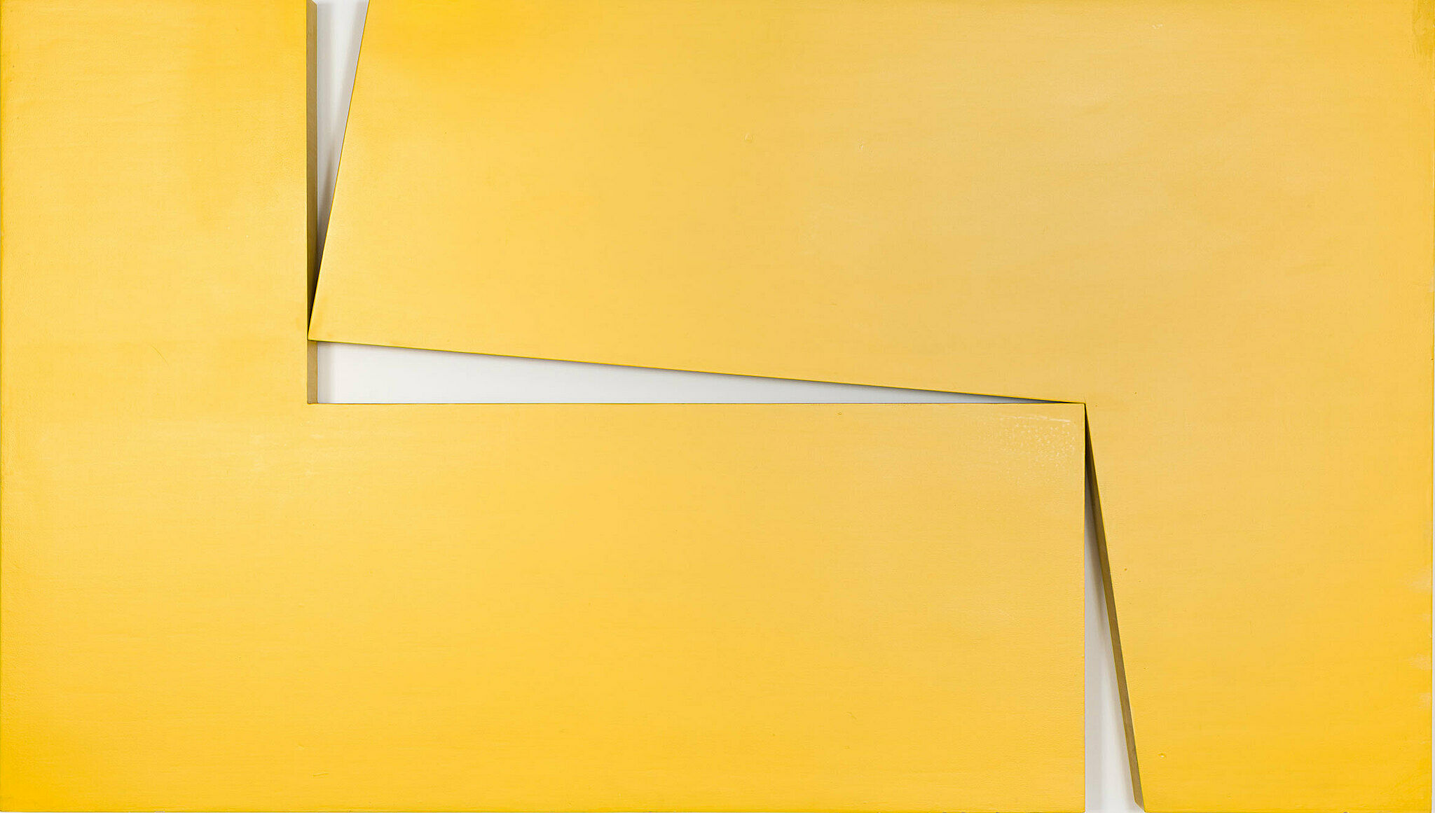 A work by Carmen Herrera. Two blocks balance in a diagonal pattern