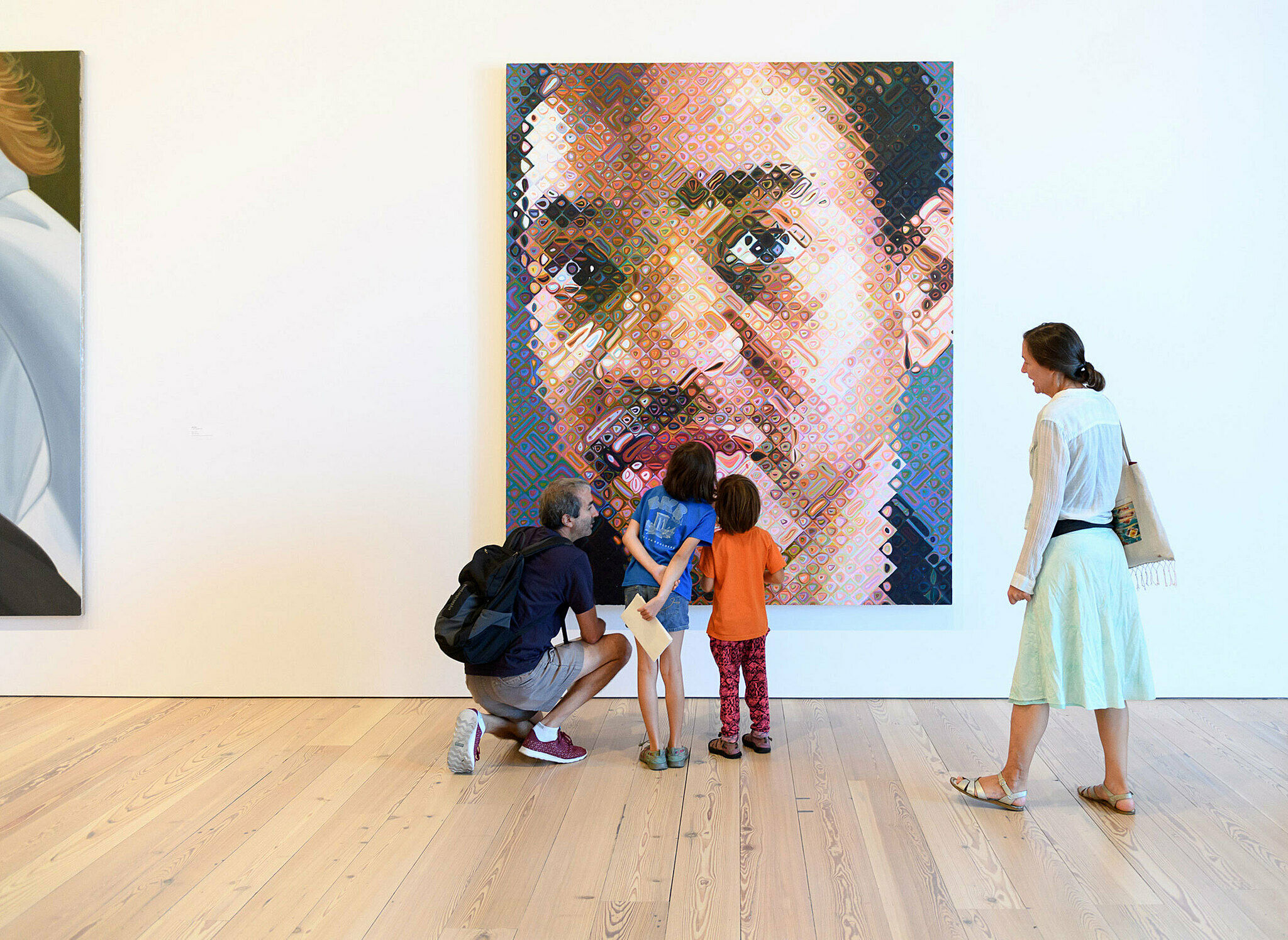 Families explore artwork in the galleries