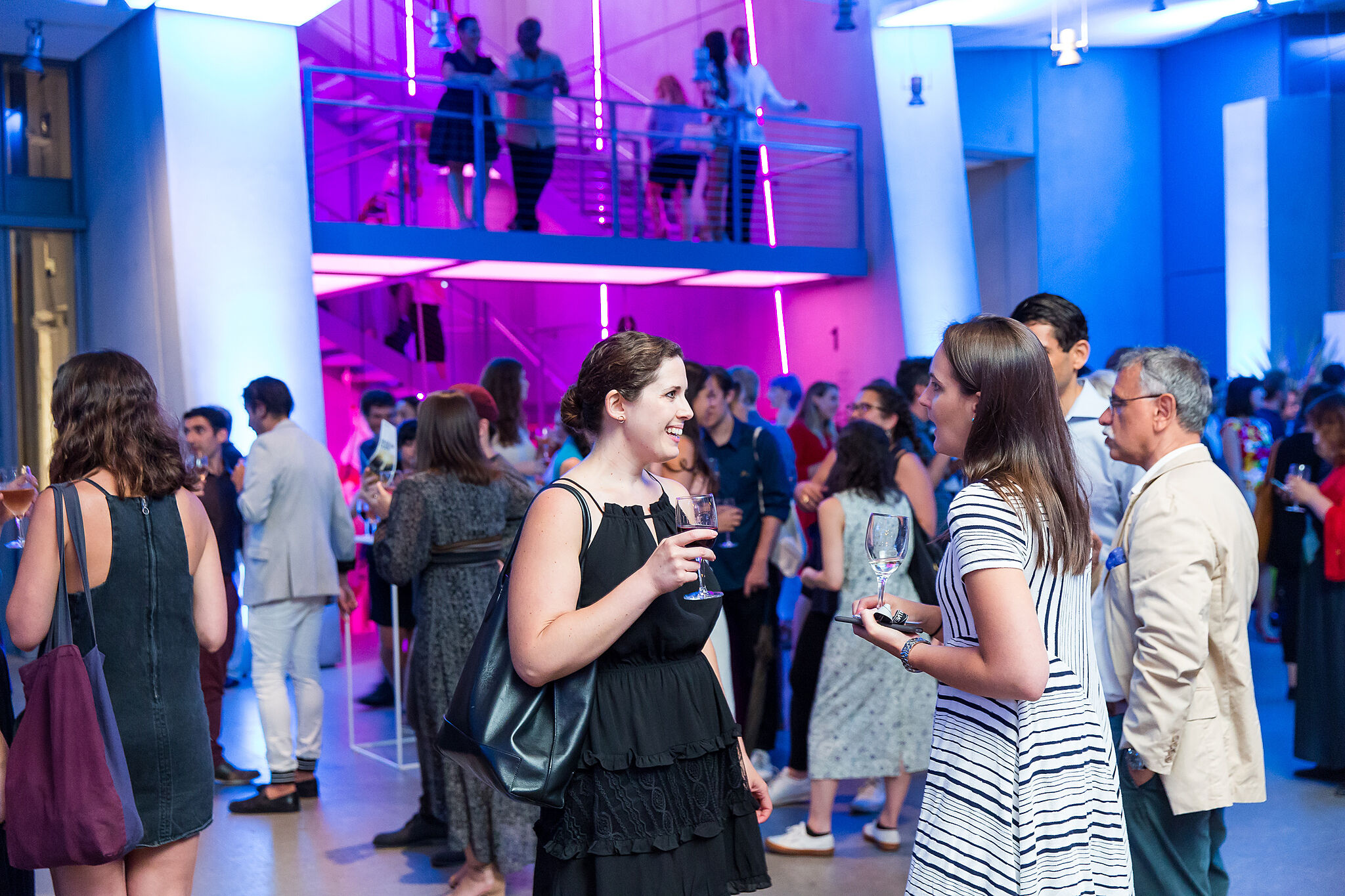 Members at an opening.