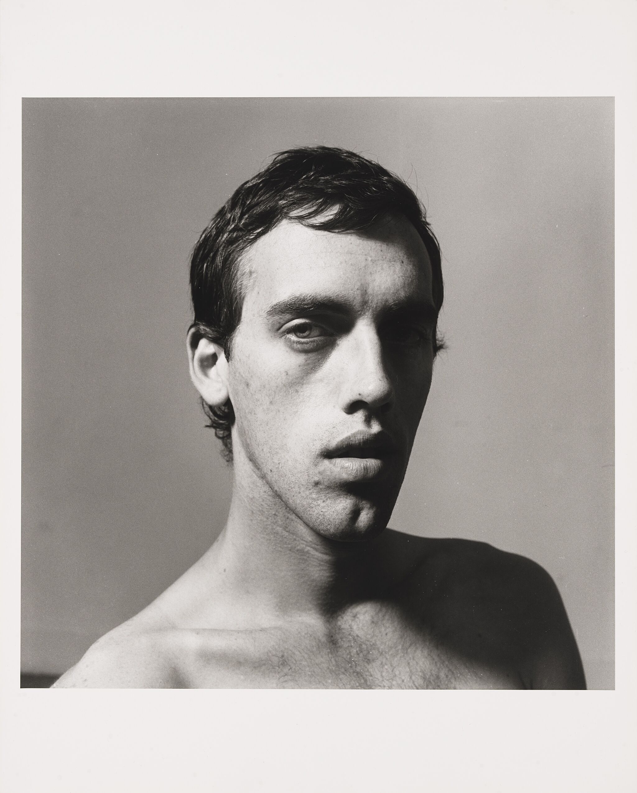 Black and white photograph of David Wojnarowicz.