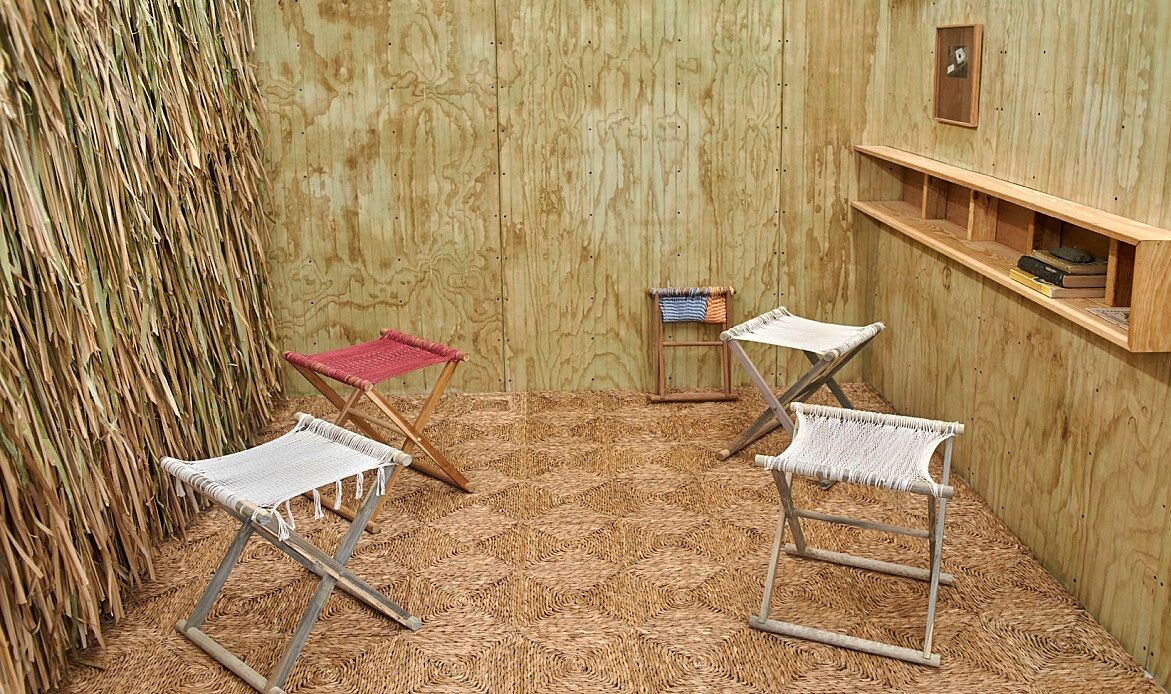 A room with a folding bench.