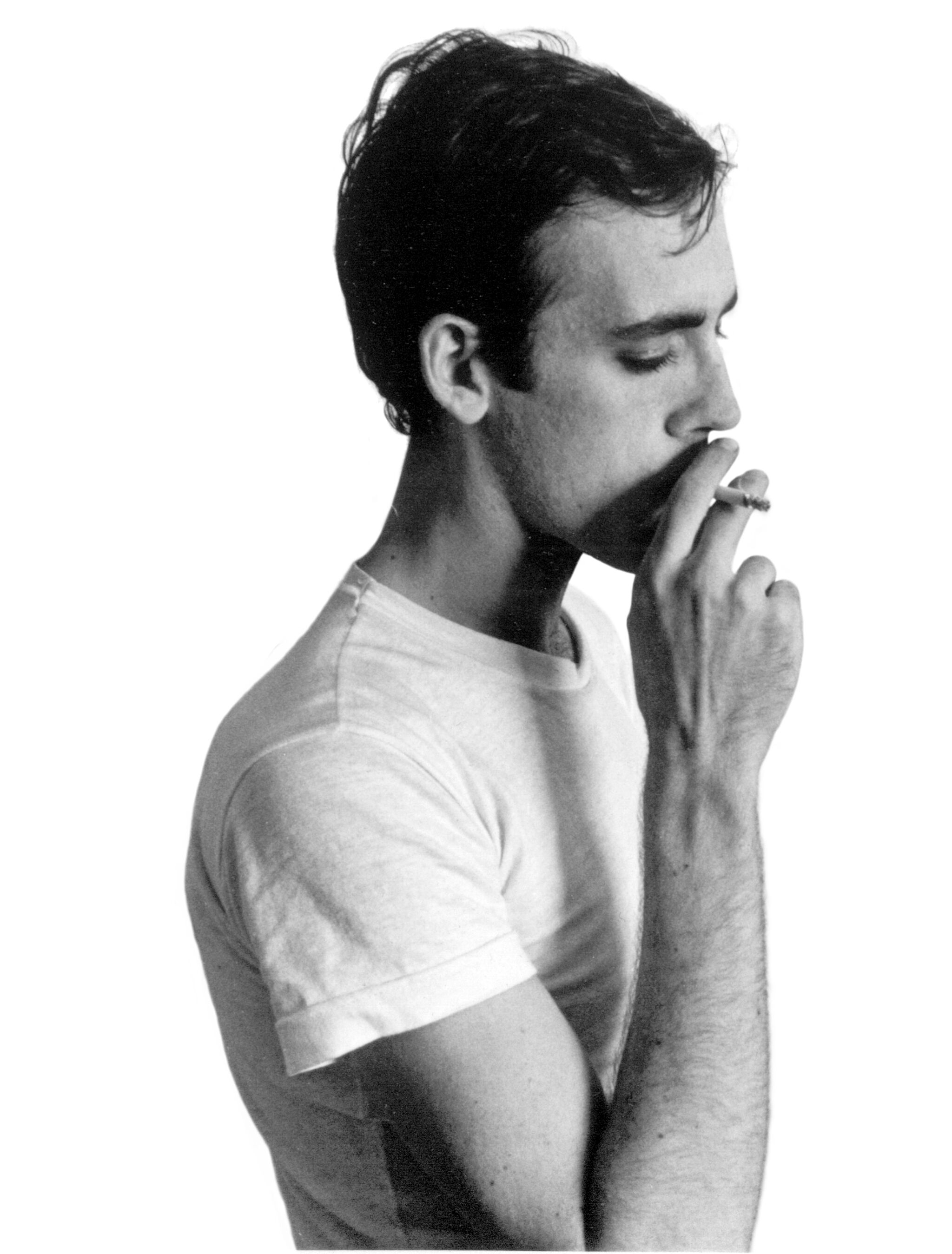 David Wojnarowicz smoking a cigarette.