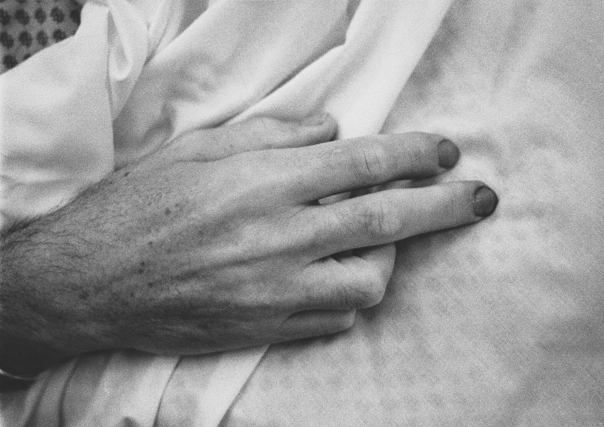 Photograph of a hand in black and white. 