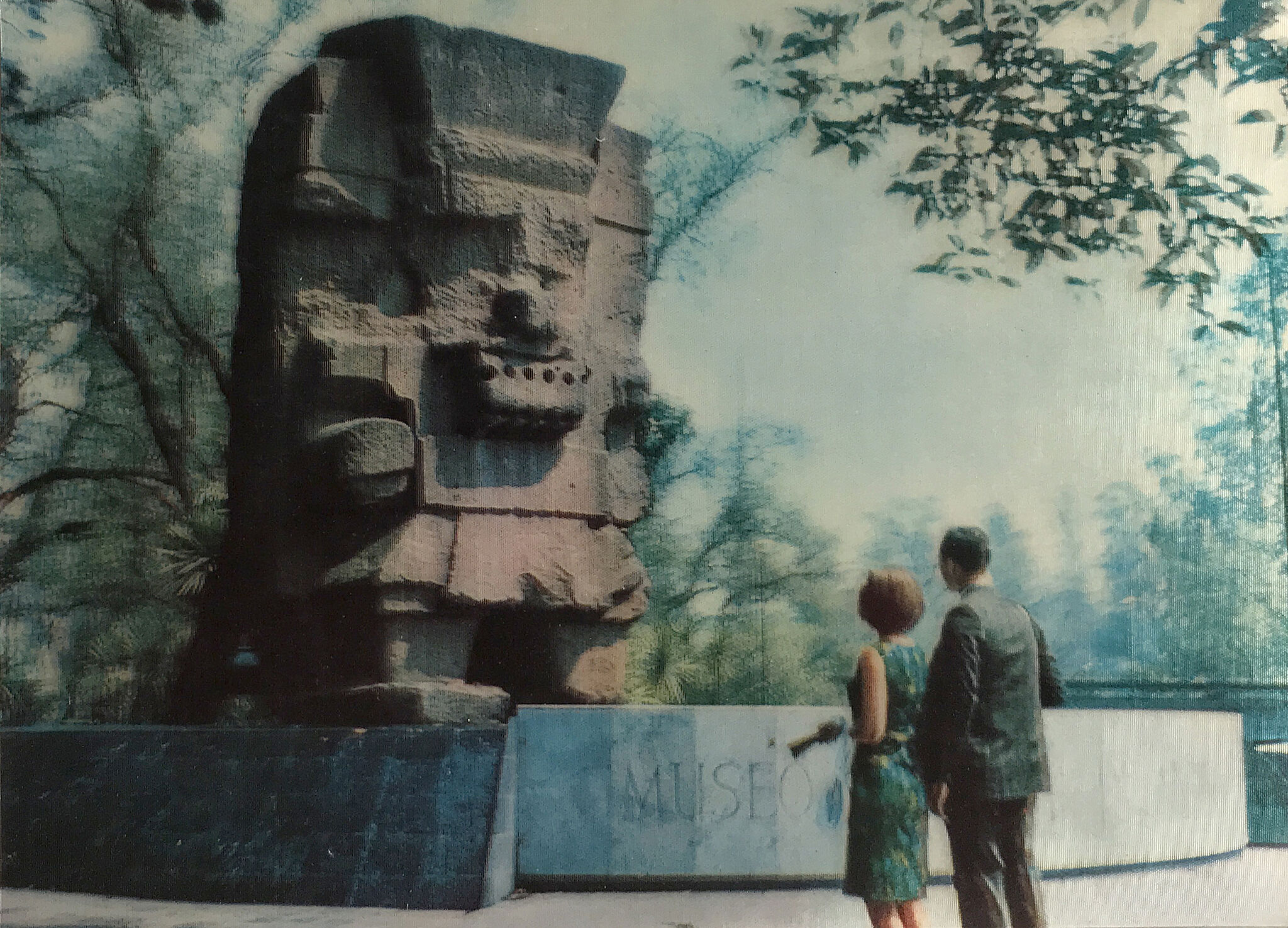 Archival photograph of people looking at ruins.