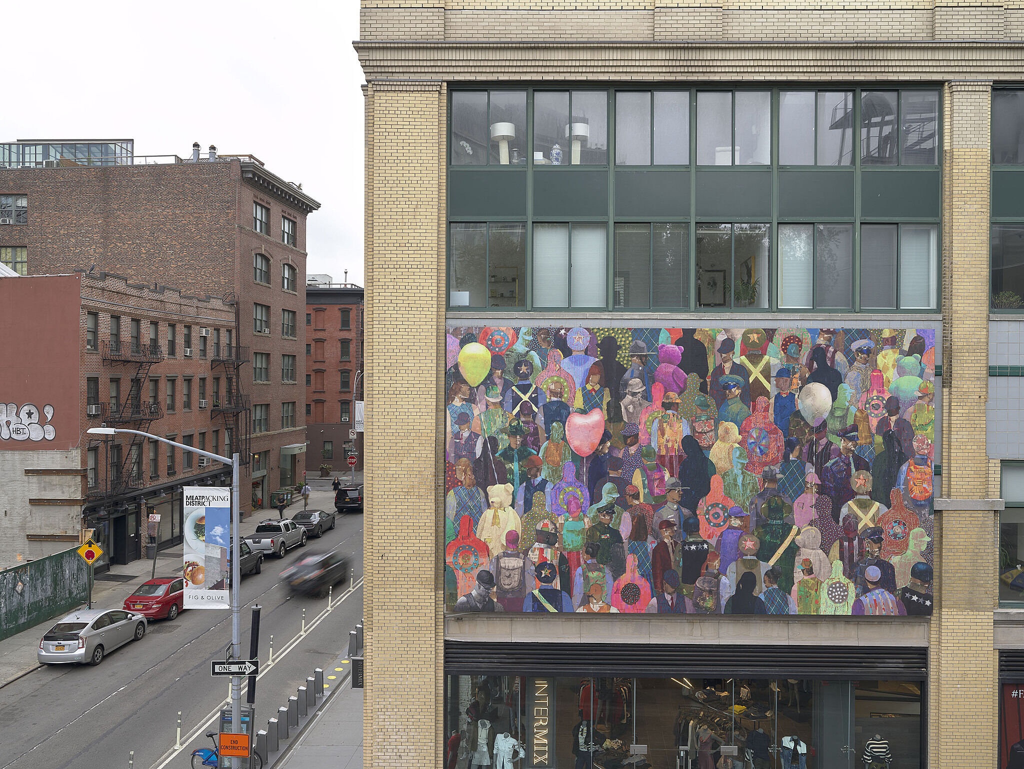 An installation image of a billboard artwork across from the Whitney Museum.